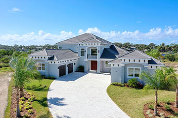 Front view of intracoastal custom home by Stoughton & Duran